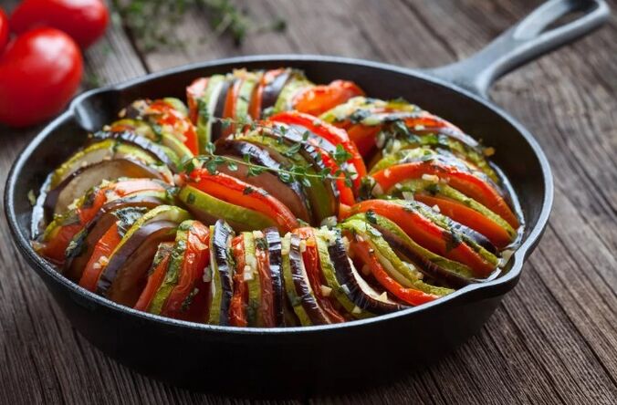 Tan with tomatoes and zucchini